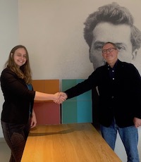 Richard Bell presenting painting to the  Mondriaanhuis Collection in Armersfoort, Holland in 2023